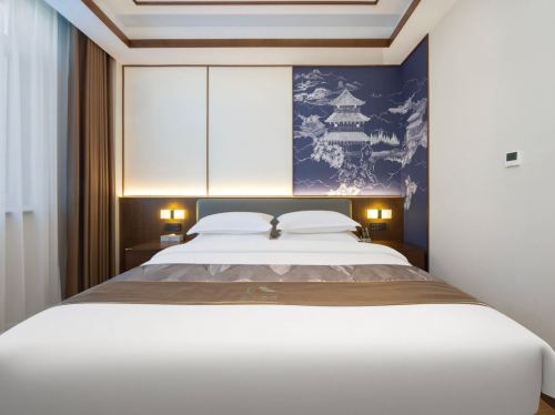 众春雅居酒店(定州古城万达广场店)
