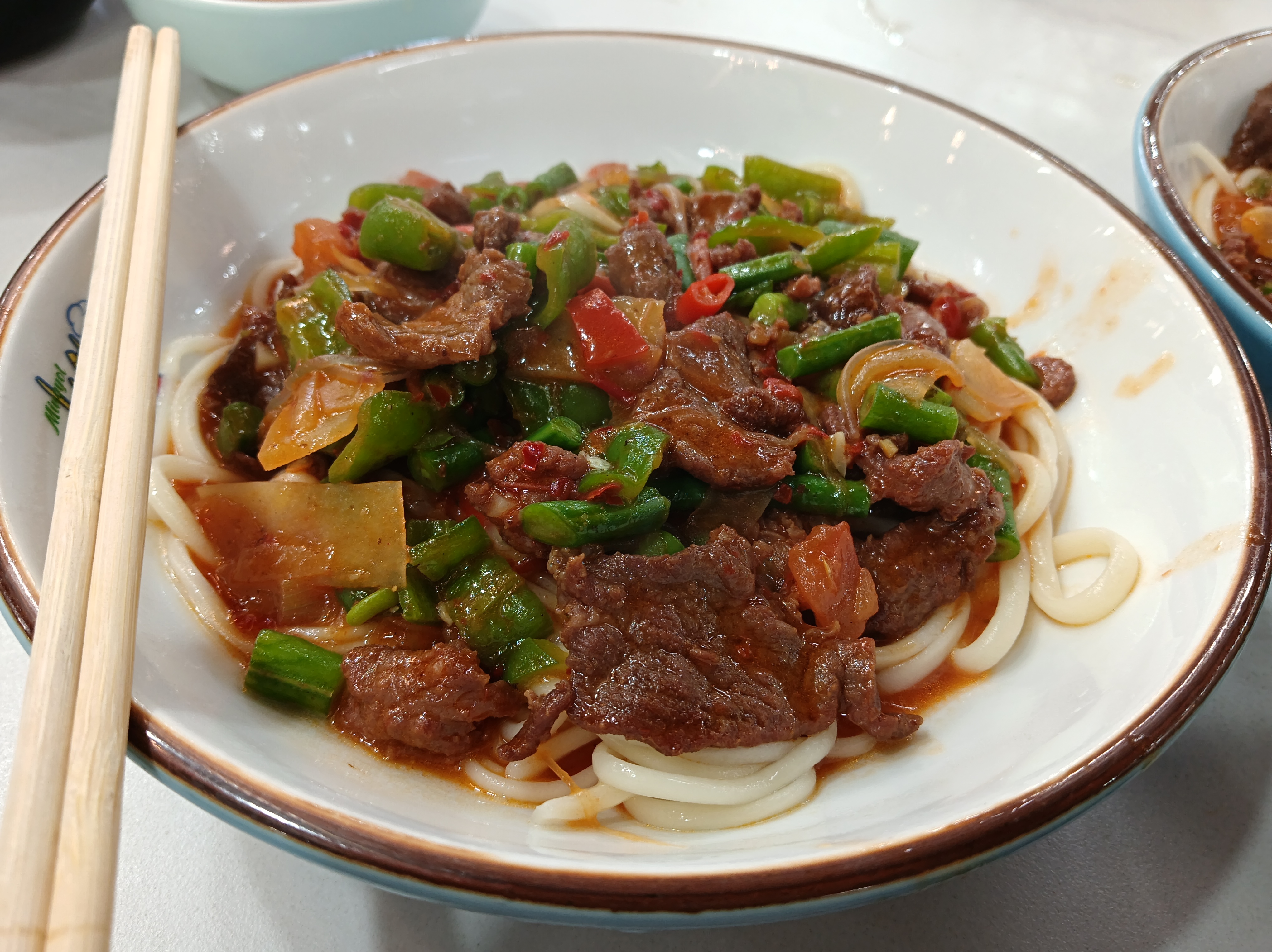 明优利特色拌面抓饭